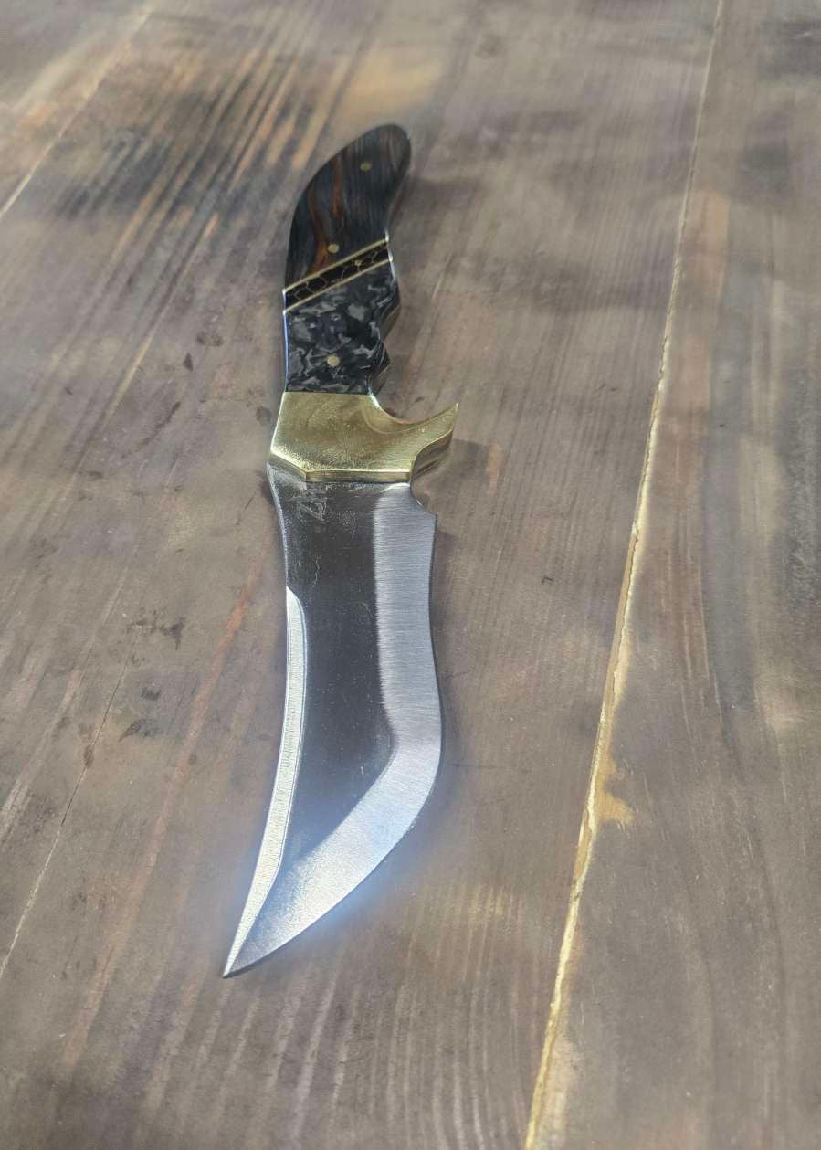 80CrV2 trailing recurve skinning knife with brass bolster, carbon fiber and dyed redwood handle