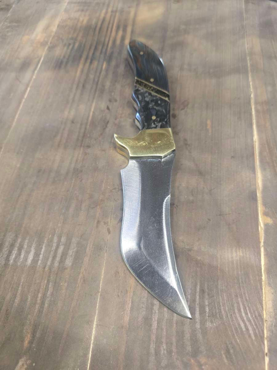 Opposite side of the 80CrV2 skinning knife showing the trailing recurve blade