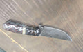 Alabama Damascus knife with desert ironwood and red linen Micarta handle, brass and nickel dividers and white G10 inlay — full profile